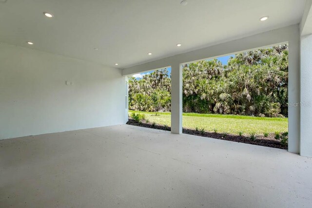 8024 Moonbeam Ave, Sarasota, FL 34241 - view of patio with view of scattered trees