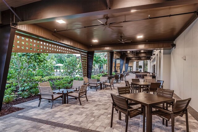 8024 Moonbeam Ave, Sarasota, FL 34241 - view of patio featuring outdoor dining area and ceiling fan