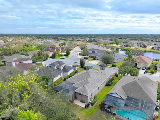 drone / aerial view with a water view