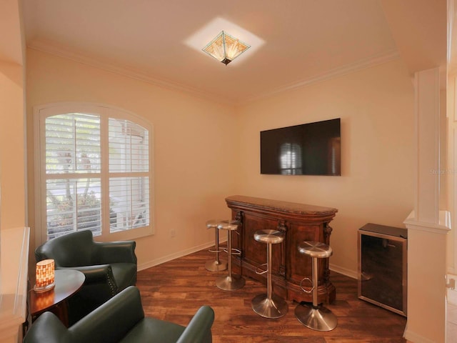 living room featuring ornamental molding and dark wood-type flooring