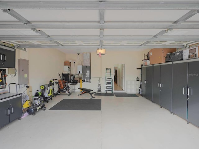 garage with electric panel and a garage door opener