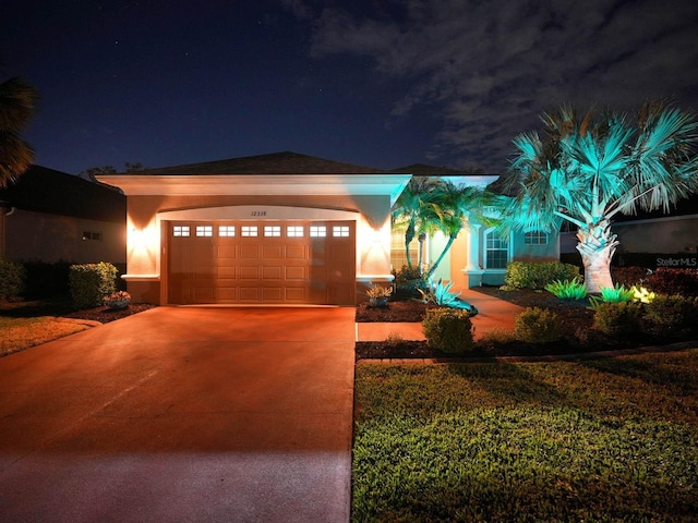 view of front of property featuring a garage