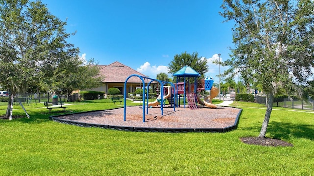 view of play area featuring a lawn