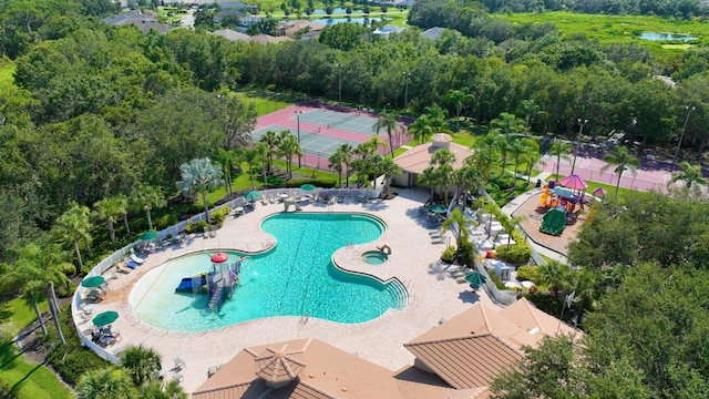 view of swimming pool with a patio area