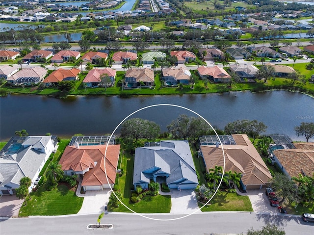 bird's eye view with a water view