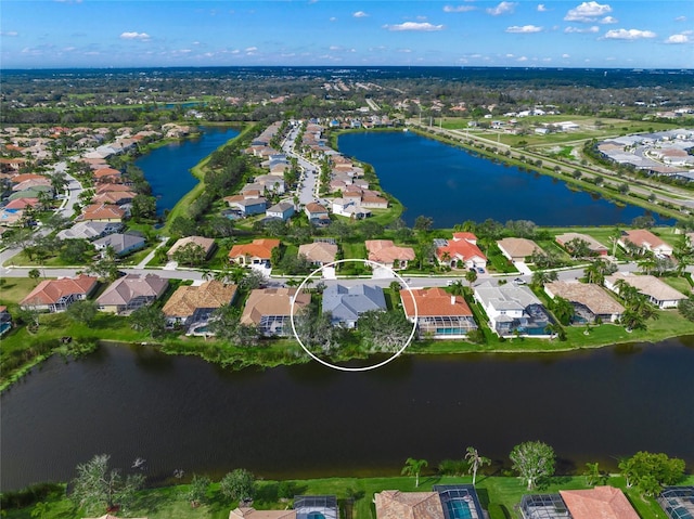 drone / aerial view featuring a water view