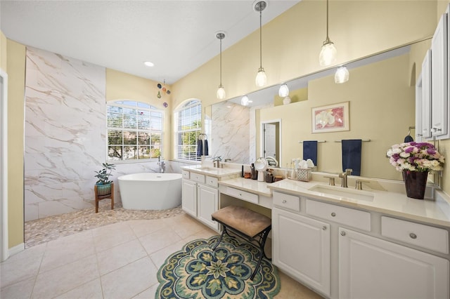 bathroom with separate shower and tub, vanity, and tile patterned floors