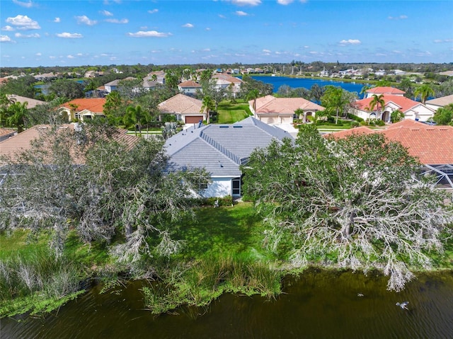 drone / aerial view featuring a water view