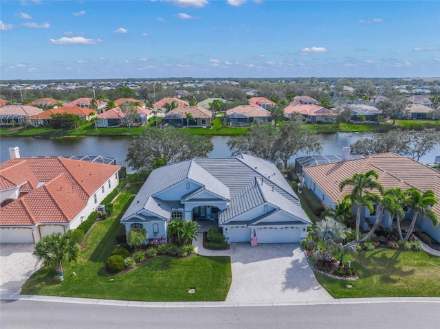 bird's eye view with a water view