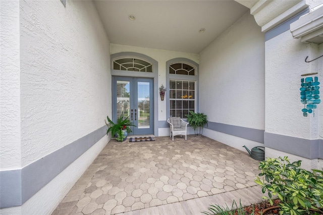 doorway to property with french doors