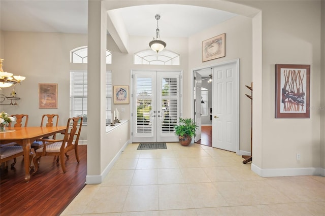 tiled entrance foyer with french doors