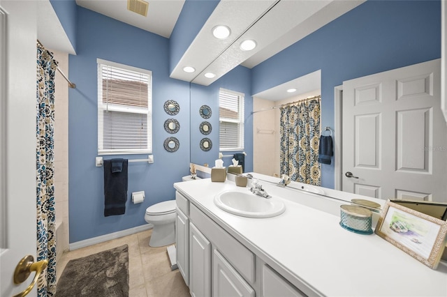 full bathroom with toilet, vanity, shower / bath combo, and tile patterned flooring