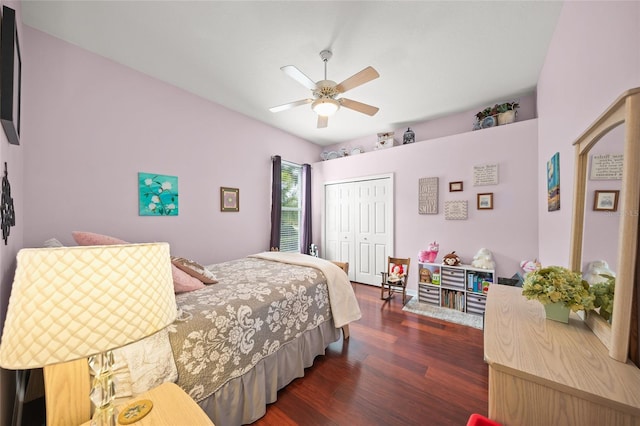 bedroom with ceiling fan, a closet, and dark hardwood / wood-style flooring