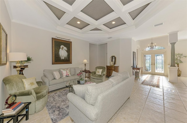 living room featuring french doors, visible vents, a high ceiling, coffered ceiling, and ornate columns