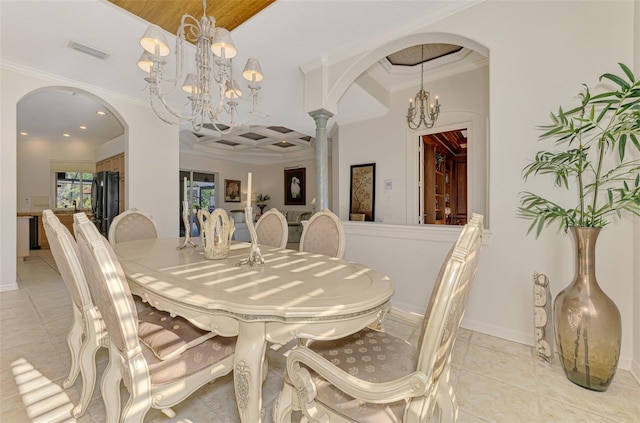 dining space with ornamental molding, arched walkways, visible vents, and a notable chandelier