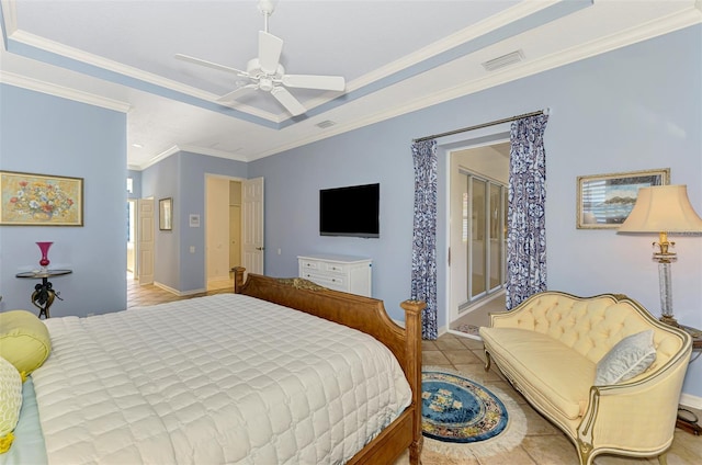 tiled bedroom featuring a tray ceiling, visible vents, ornamental molding, a ceiling fan, and baseboards