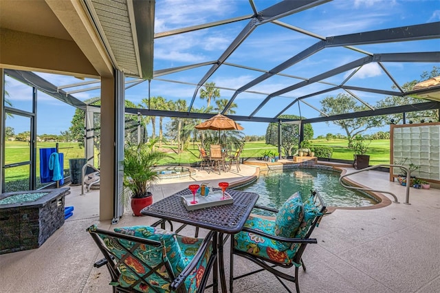 view of patio with a lanai and an outdoor pool