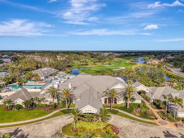 aerial view with a water view and golf course view