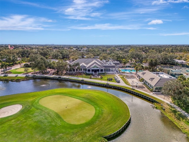 bird's eye view with view of golf course and a water view