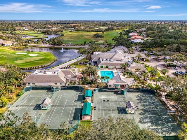 bird's eye view with view of golf course and a water view