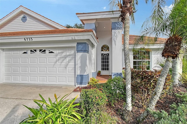 view of front of property featuring a garage