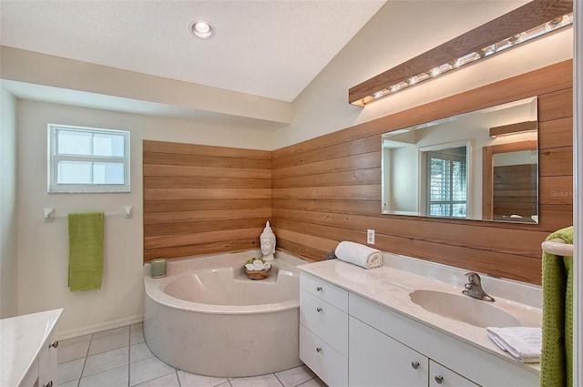 bathroom with tile patterned flooring, lofted ceiling, wood walls, and vanity