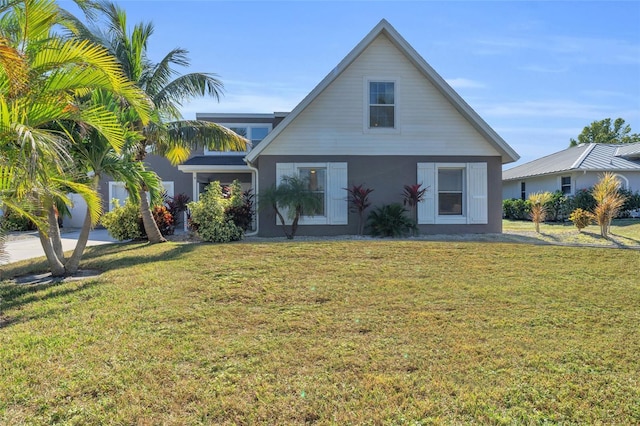 view of front facade with a front lawn