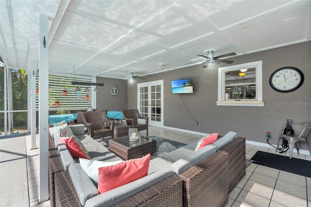 view of patio featuring ceiling fan and an outdoor living space