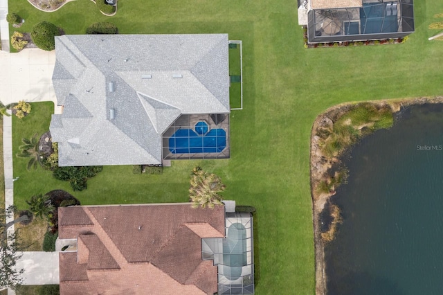 drone / aerial view with a water view