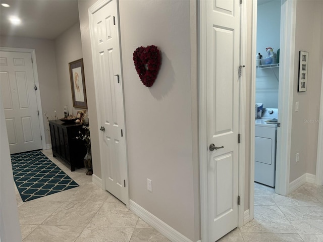 hallway featuring washer / dryer