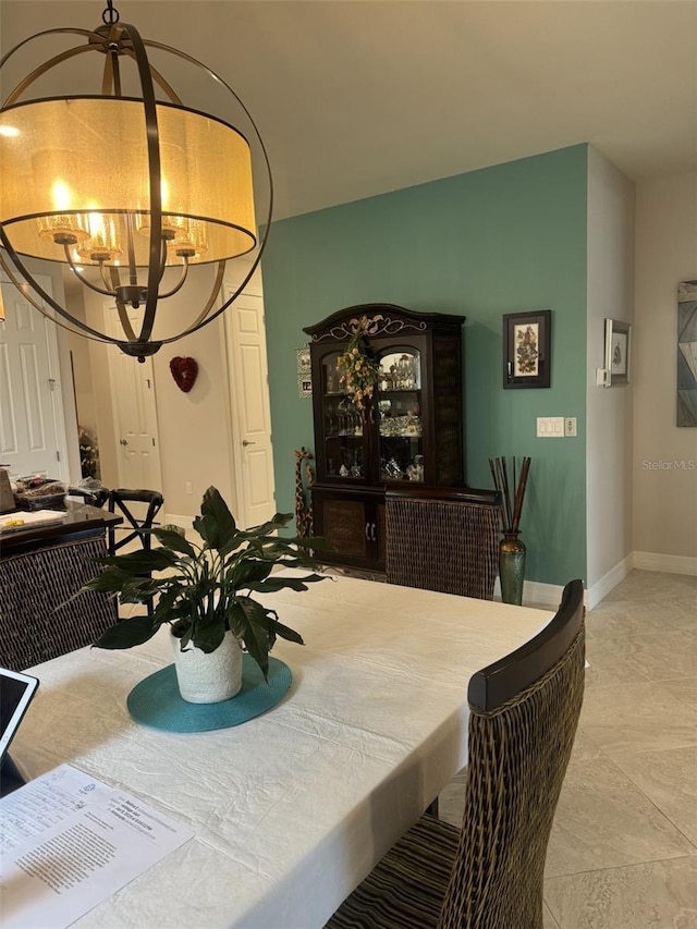 dining room with a chandelier