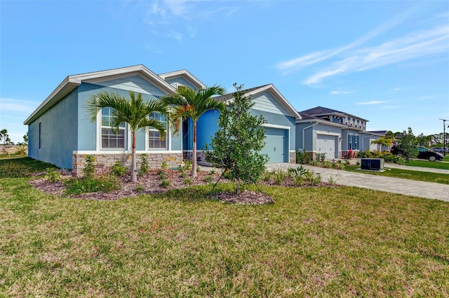 view of front of house with a front lawn and a garage