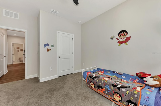 unfurnished bedroom featuring ceiling fan and carpet flooring