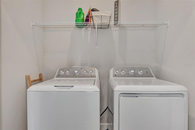 laundry room with washer and dryer