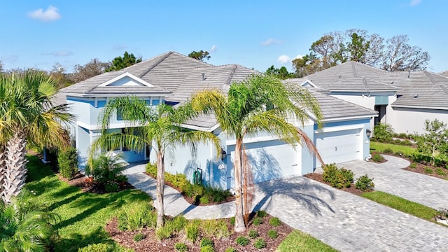 view of front of property featuring a garage