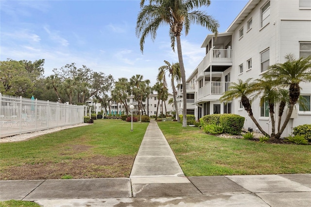 view of community featuring a yard