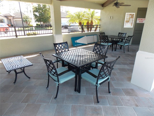 view of patio featuring ceiling fan