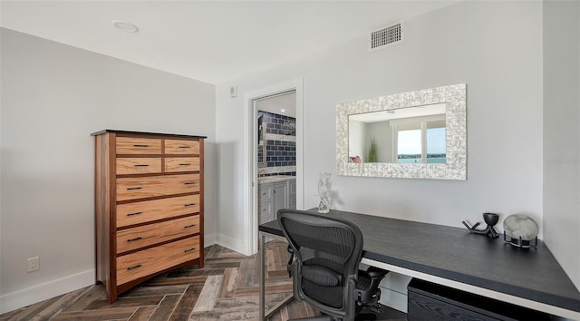 office featuring dark parquet floors