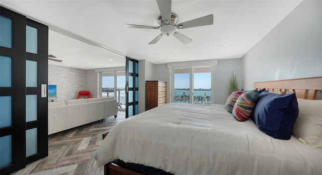 bedroom with parquet flooring and ceiling fan