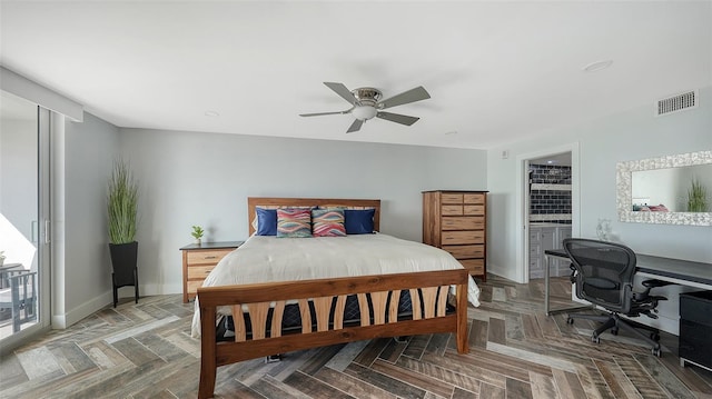 bedroom featuring parquet flooring and ceiling fan