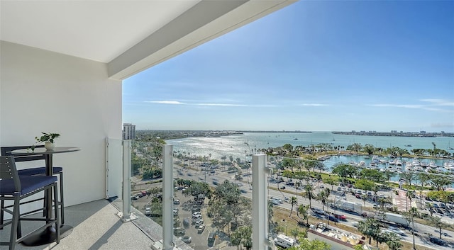 balcony featuring a water view