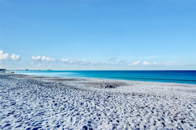 property view of water featuring a beach view