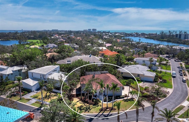 bird's eye view with a water view