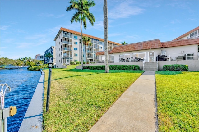 view of property with a water view