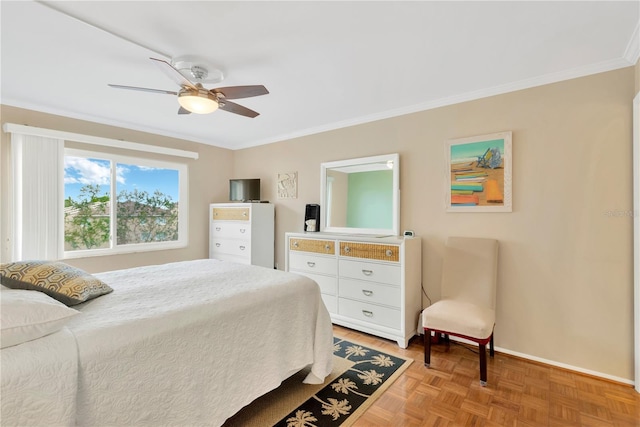 bedroom featuring crown molding, ceiling fan, and light parquet floors