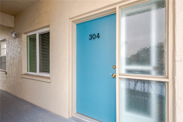 1600 1st Ave W Unit 304A, Bradenton, FL 34205 - property entrance with stucco siding