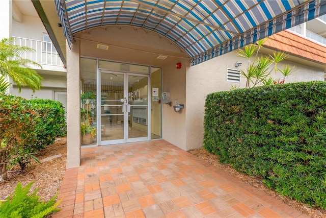 1600 1st Ave W Unit 304A, Bradenton, FL 34205 - view of exterior entry with stucco siding