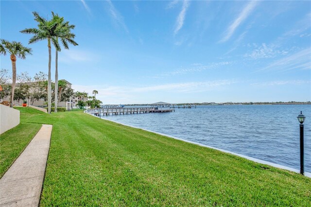 1600 1st Ave W Unit 304A, Bradenton, FL 34205 - dock with a yard and a water view