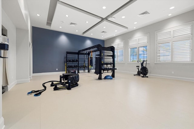 exercise room featuring recessed lighting, visible vents, and baseboards