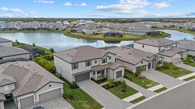 aerial view featuring a water view and a residential view